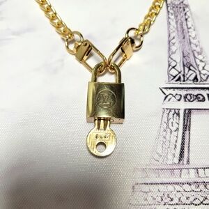 #227 Louis vuitton lock and key with chain